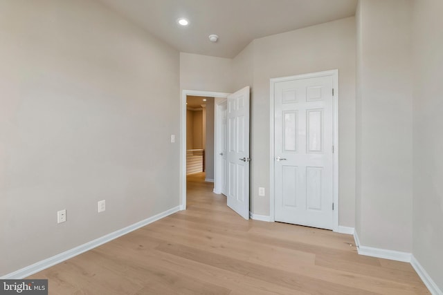 unfurnished bedroom with light hardwood / wood-style flooring