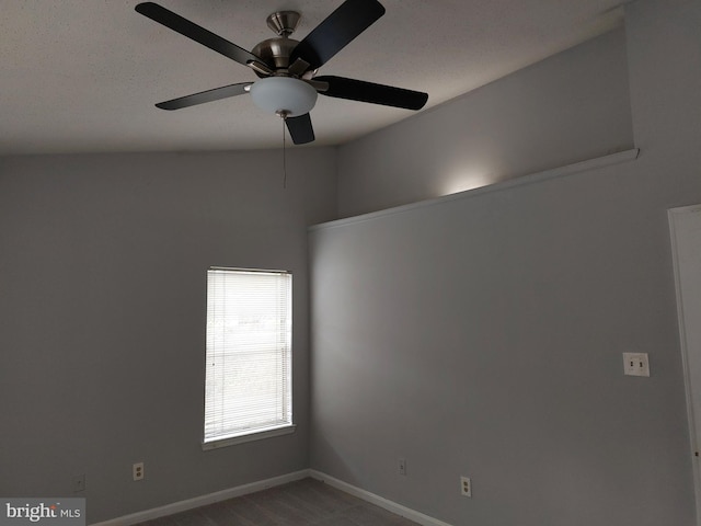 spare room with ceiling fan and carpet floors