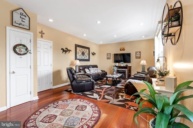 living room with dark wood-type flooring