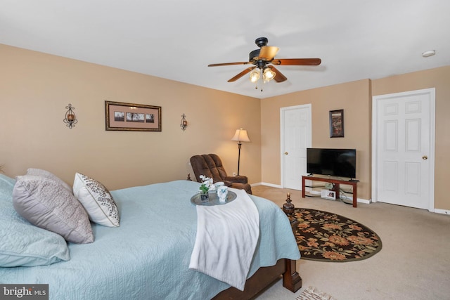 bedroom featuring ceiling fan and carpet floors