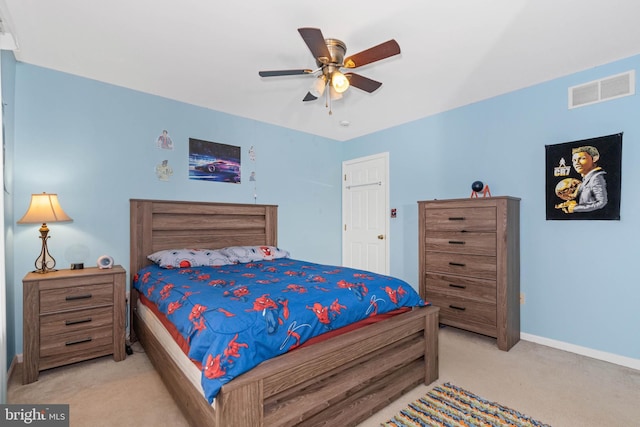 bedroom featuring ceiling fan and light colored carpet