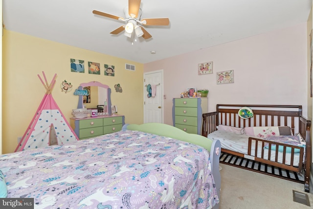 carpeted bedroom featuring ceiling fan