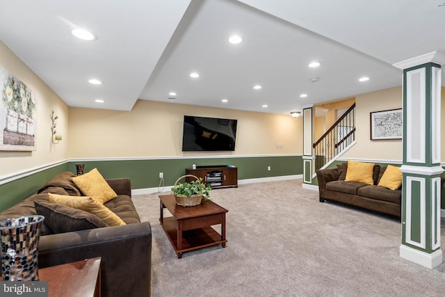 living room with carpet and decorative columns