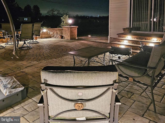 view of patio at twilight