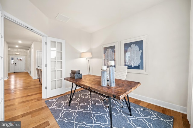 office with hardwood / wood-style floors