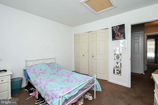 bedroom featuring dark carpet