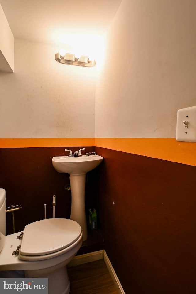 bathroom featuring toilet