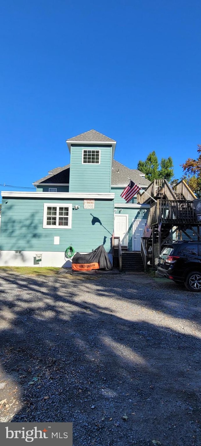 view of front of house featuring a deck