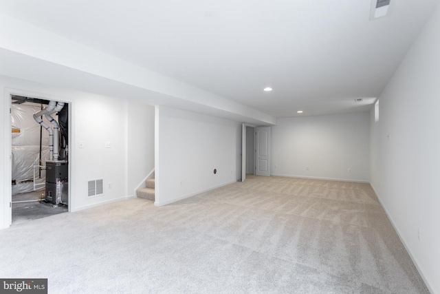 basement with light colored carpet