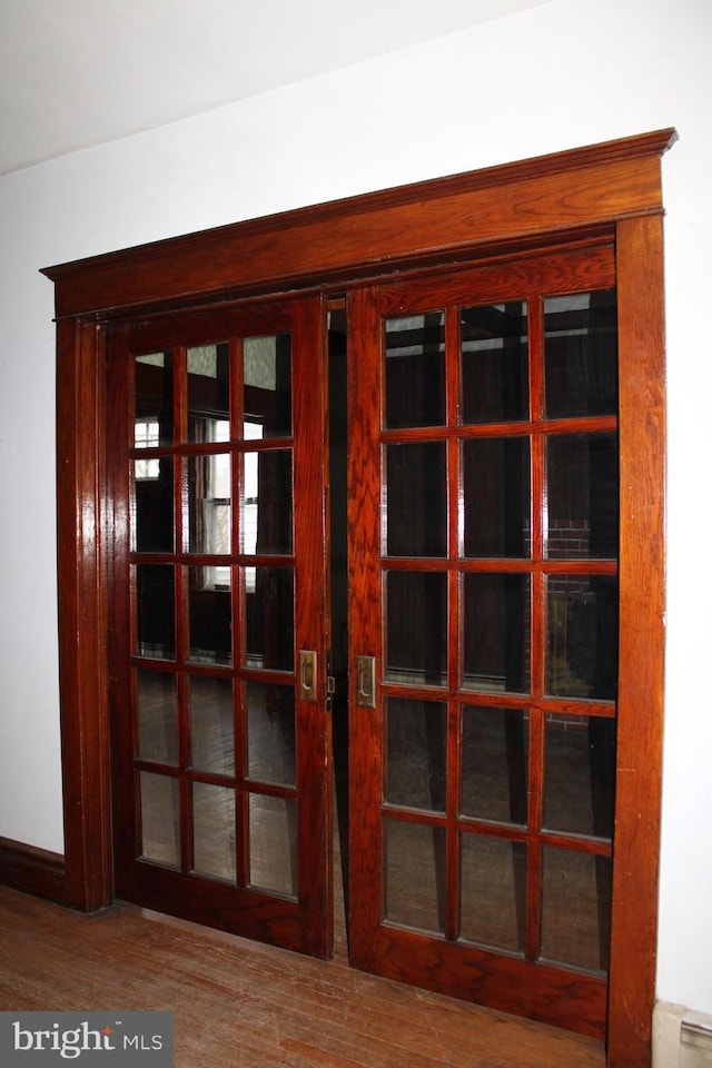 details featuring french doors and wood-type flooring