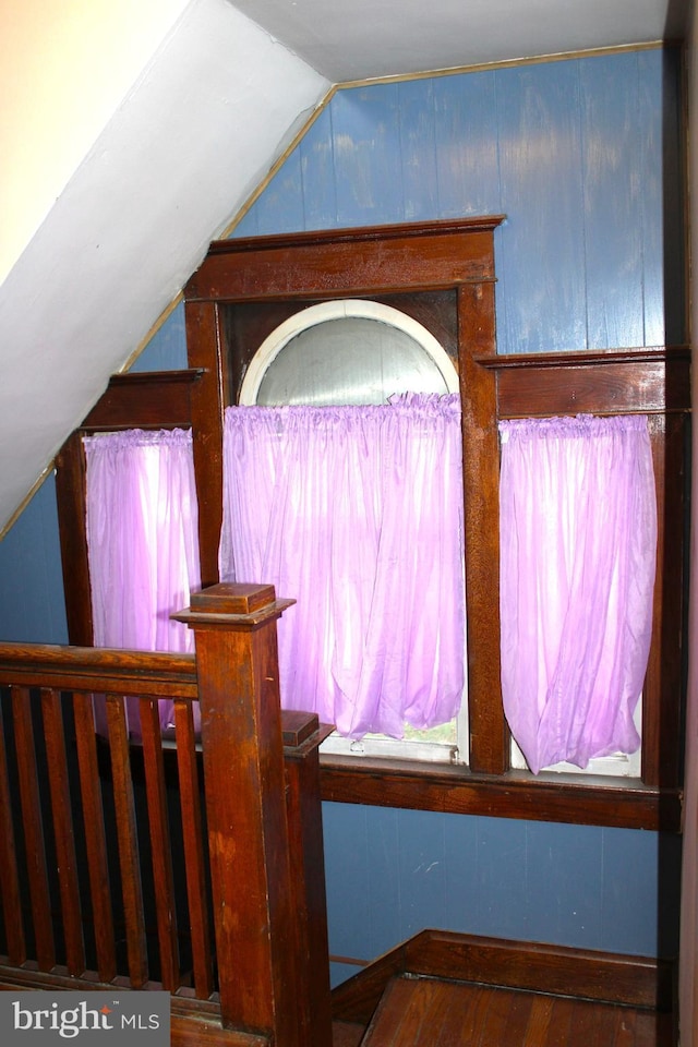 unfurnished bedroom with vaulted ceiling