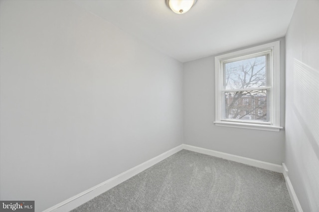 unfurnished room featuring carpet floors