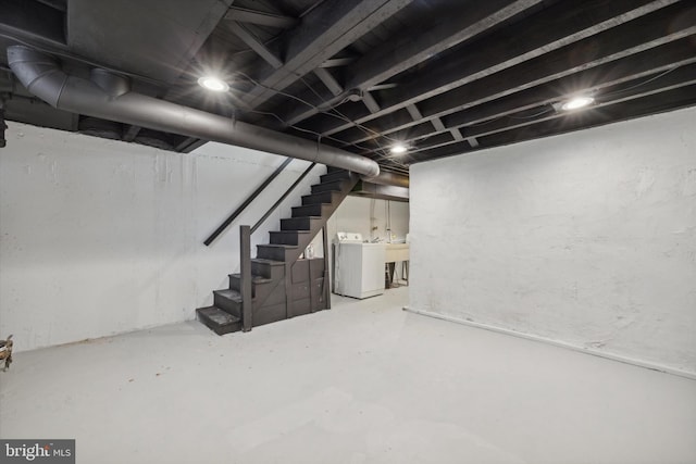 basement featuring washing machine and dryer