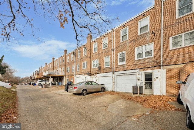 view of building exterior featuring a garage