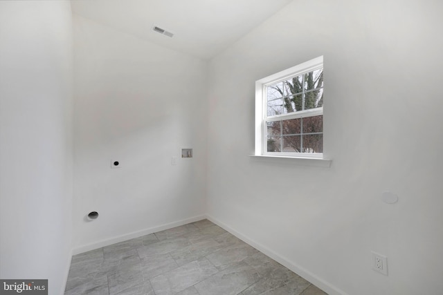 clothes washing area with laundry area, baseboards, visible vents, hookup for an electric dryer, and washer hookup