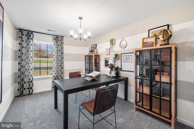 home office featuring carpet flooring and an inviting chandelier