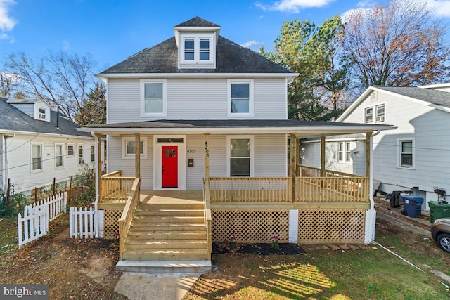 view of property featuring a porch