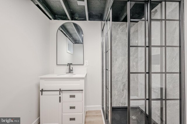 415 Tamara Cir, Newark, DE 19711 - bathroom featuring vanity, baseboards, a walk in shower, and wood finished floors