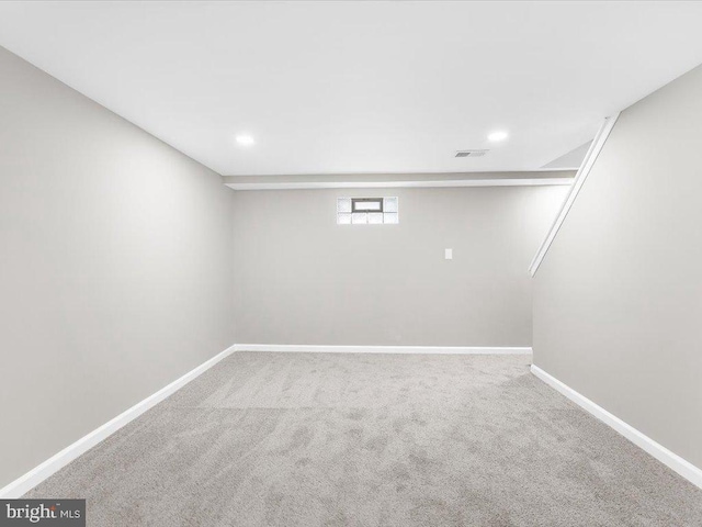 basement featuring carpet floors