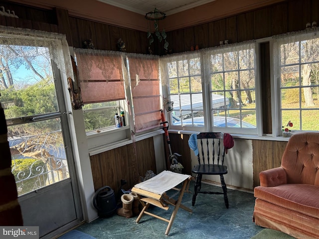 sunroom / solarium with a wealth of natural light