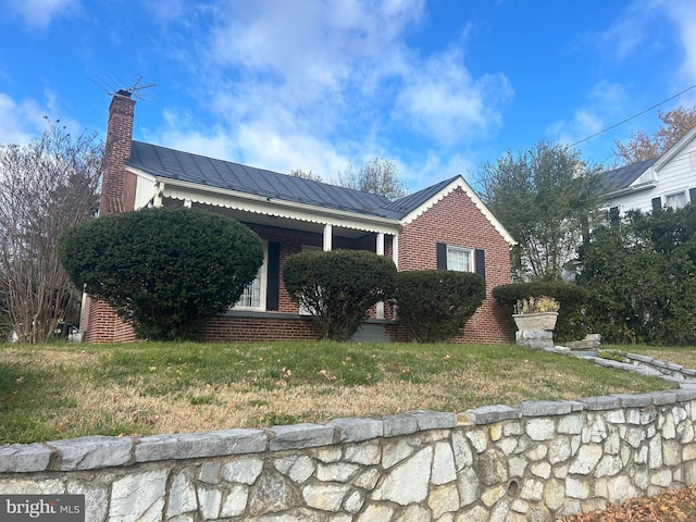 view of front of home with a front yard