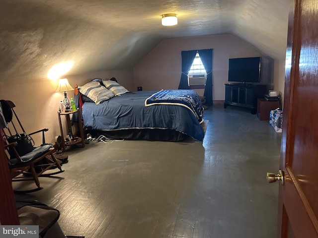 bedroom featuring cooling unit, a textured ceiling, and vaulted ceiling