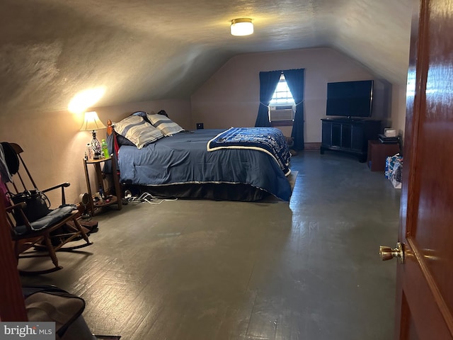 bedroom with a textured ceiling, cooling unit, and lofted ceiling