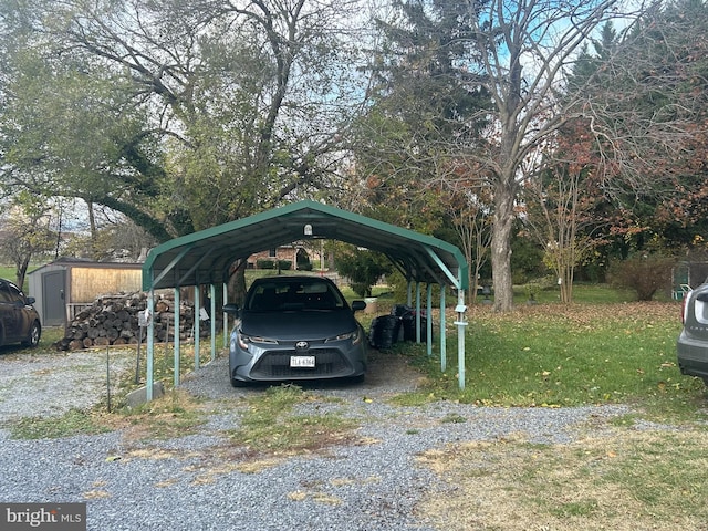 view of vehicle parking with a carport