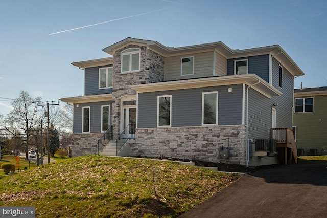 2418 Taney Rd, Baltimore, MD 21209 - view of front facade with stone siding and entry steps