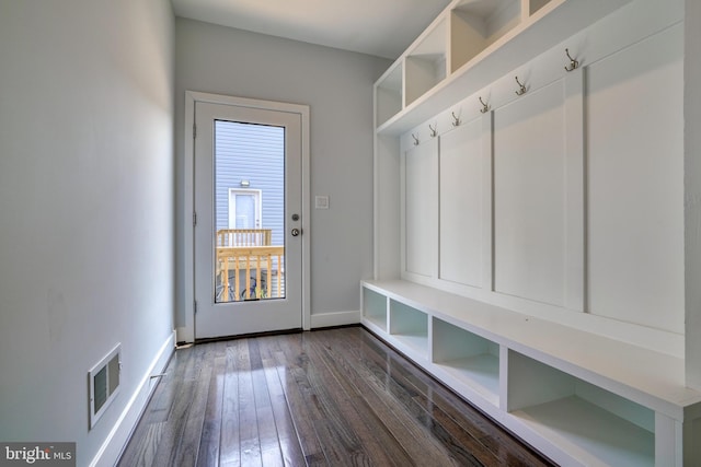 mudroom with dark hardwood / wood-style floors