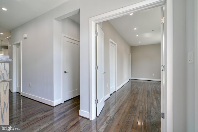 2418 Taney Rd, Baltimore, MD 21209 - hall with dark wood finished floors, baseboards, and recessed lighting