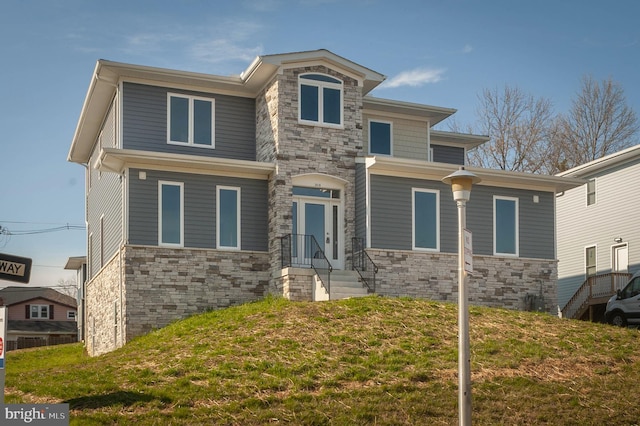 2418 Taney Rd, Baltimore, MD 21209 - view of front facade featuring stone siding and a front yard