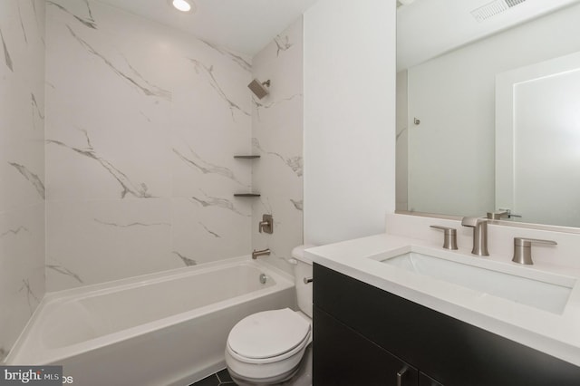 full bathroom featuring vanity, tiled shower / bath combo, and toilet