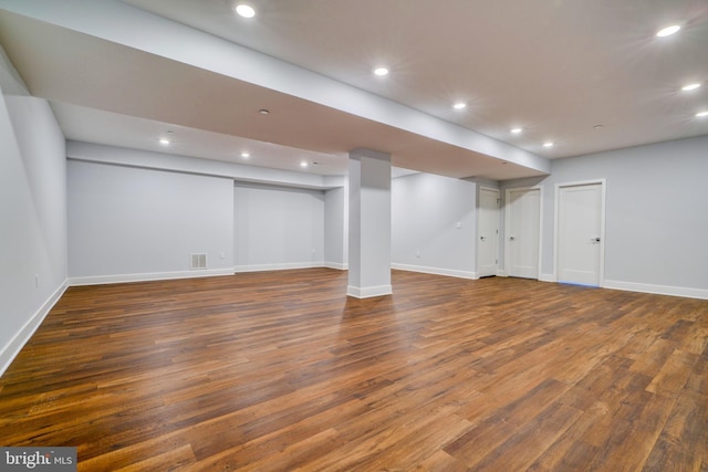 2418 Taney Rd, Baltimore, MD 21209 - finished below grade area featuring wood finished floors, recessed lighting, and baseboards