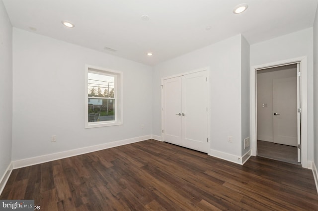 2418 Taney Rd, Baltimore, MD 21209 - unfurnished bedroom with dark wood finished floors, baseboards, recessed lighting, and a closet