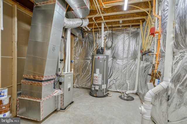 utility room with heating unit and water heater