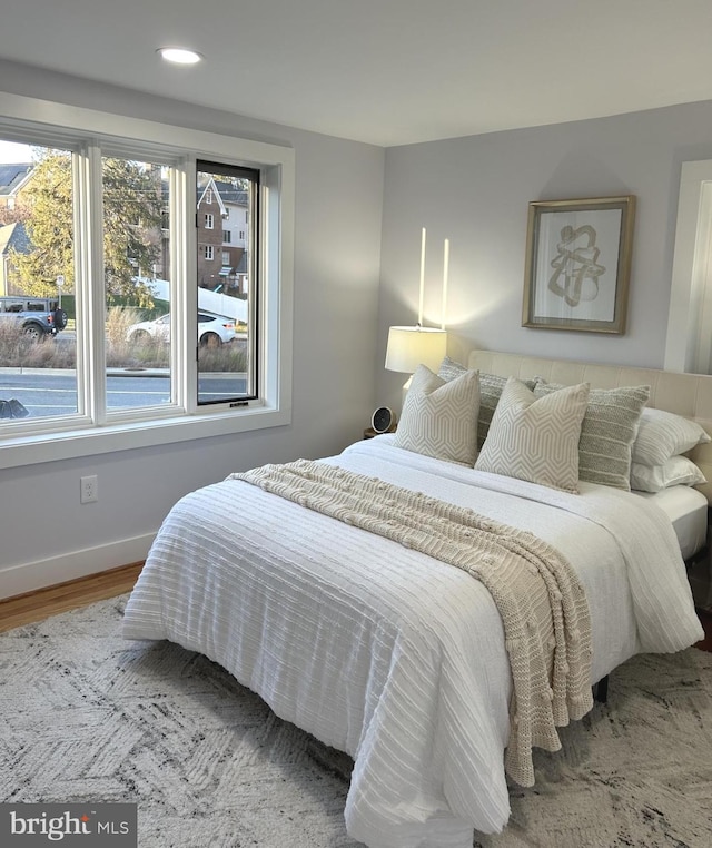 bedroom featuring wood-type flooring