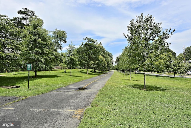 surrounding community with a lawn