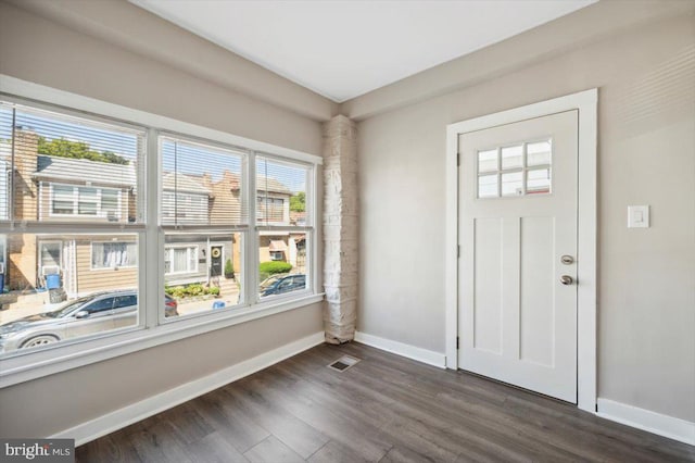 foyer featuring dark hardwood / wood-style floors