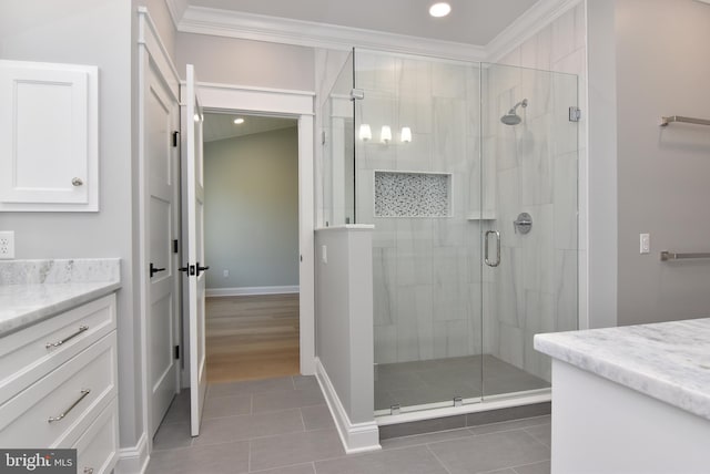 20682 Maple St, Rehoboth Beach, DE 19971 - full bath featuring vanity, tile patterned flooring, a stall shower, crown molding, and recessed lighting