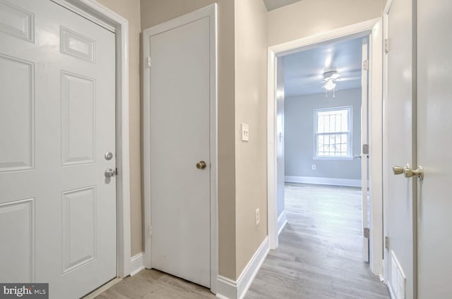 hallway featuring light wood-type flooring