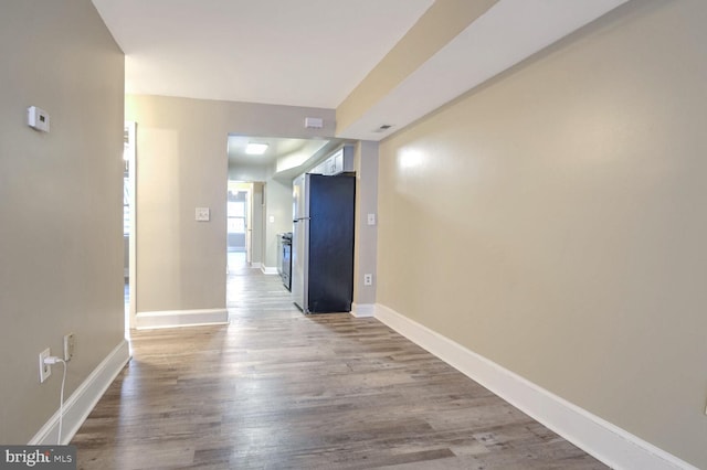 hallway featuring light wood-type flooring