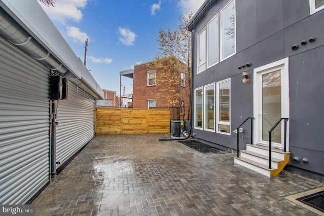 view of patio with central AC