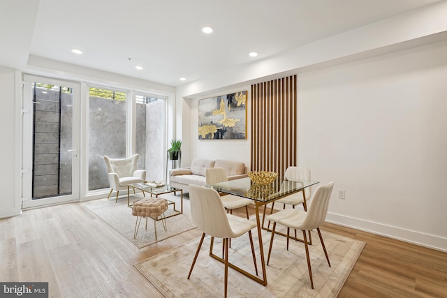 dining room with light hardwood / wood-style floors