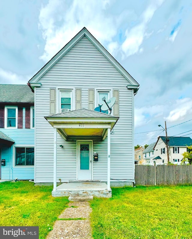 view of front of home with a front lawn