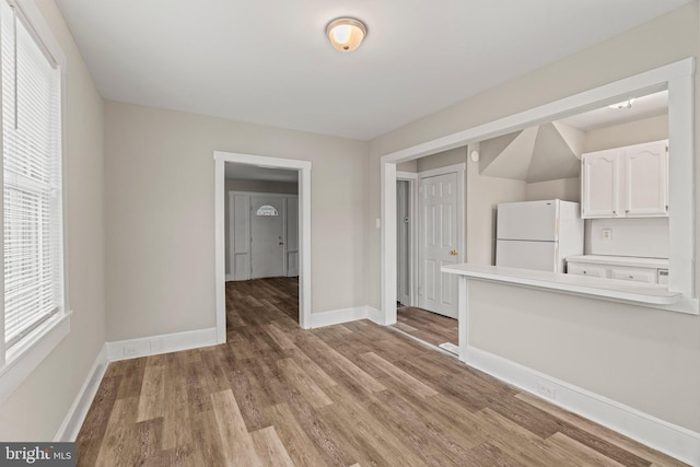 interior space with light hardwood / wood-style flooring