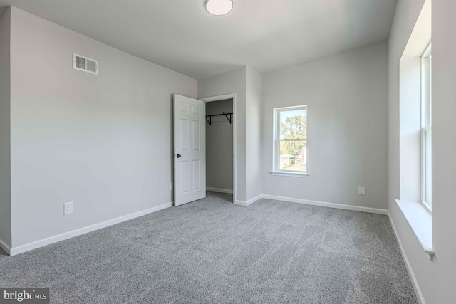 unfurnished bedroom with carpet