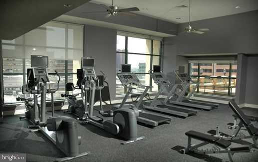 gym featuring ceiling fan