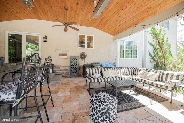 view of patio / terrace with an outdoor living space and ceiling fan