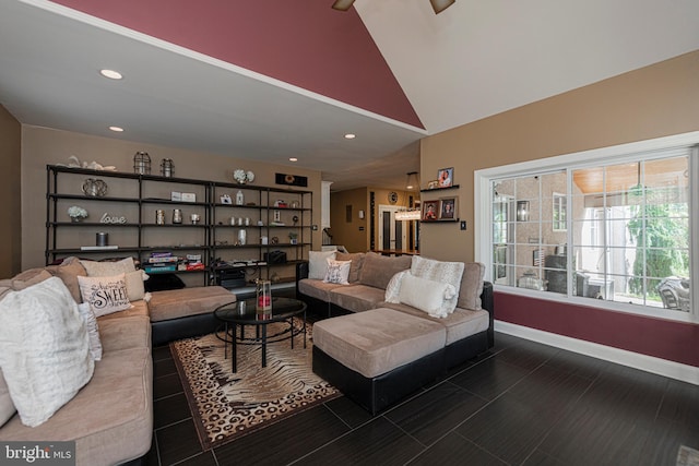 living room with high vaulted ceiling